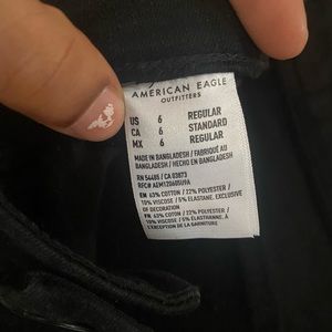 Black American eagle ripped at the knee jeans never worn